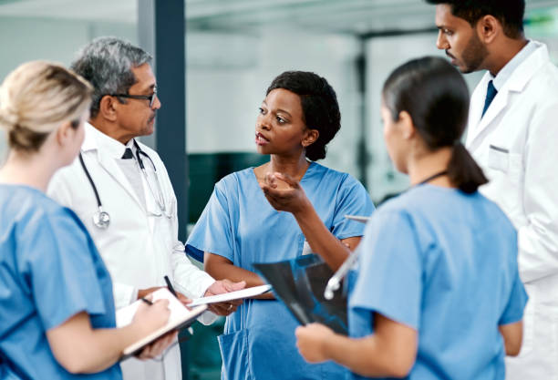 Shot of a group of medical practitioners having a discussion in a hospital